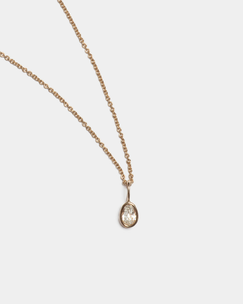 14k Signature Egg Diamond Floating Pendant
