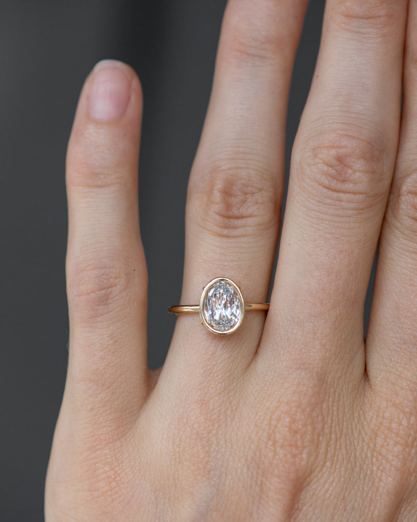 14k Signature Egg Diamond Floating Ring