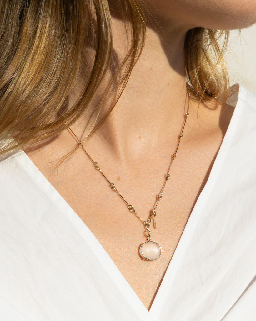14k Floating Moonstone Bone Chain Pendant