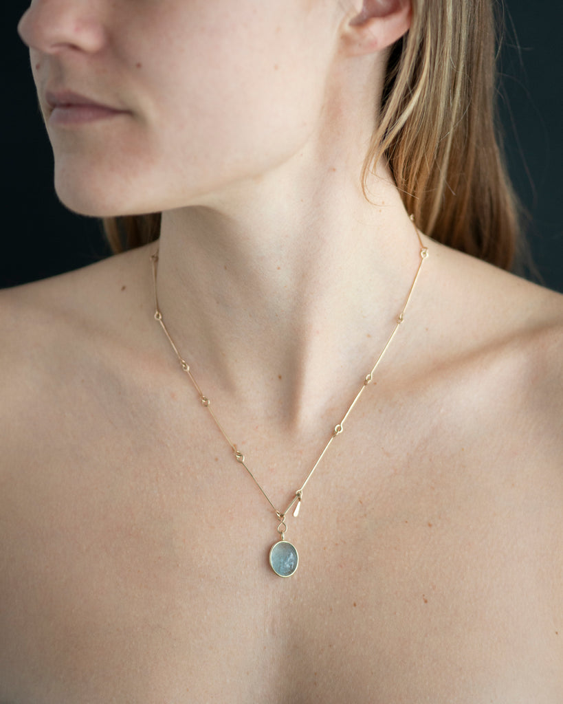 14k A Small Wave Floating Pendant